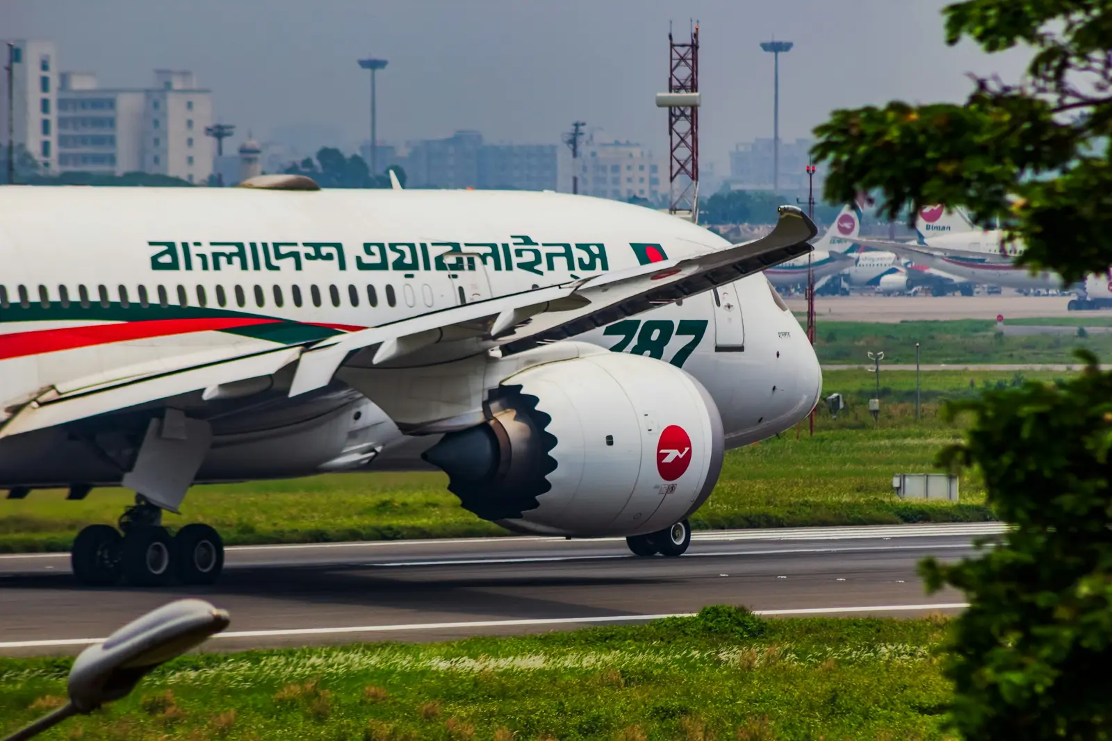 Home Biman Bangladesh Airlines aircraft on an airport runway